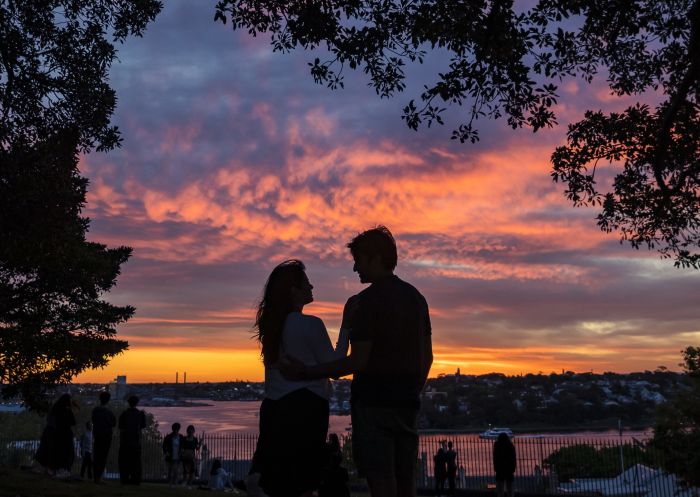 Couple enjoying the sunset from Observatory Hill, Millers Point