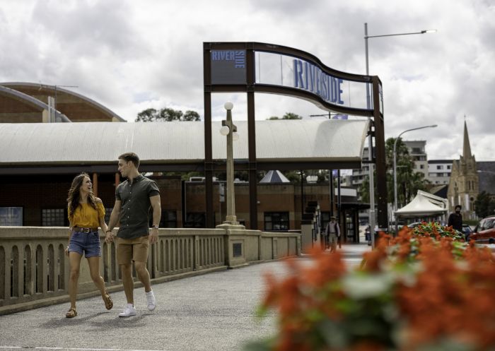 Couple walking past Riverside Theatre, Parramatta in Sydney's west