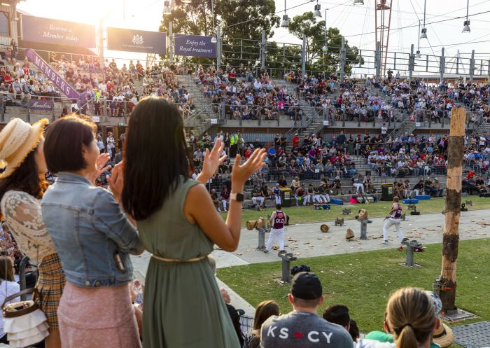 Crowds enjoying the woodchopping competition at the 2019 Sydney Royal Easter Show, Sydney Showground at Sydney Olympic Park.