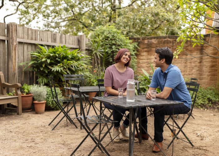 Couple enjoying a visit to the historic Elizabeth Farm estate, Rosehill in Sydney's west