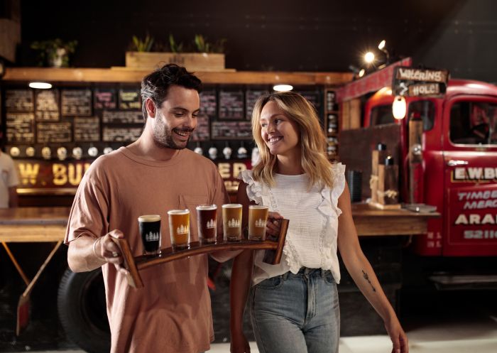 Couple enjoying beers at the 4 Pines Brewing Co. Truck Bar, Brookvale