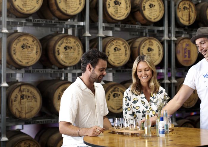 Couple enjoying a gin distillery tour and tasting experience at Manly Spirits Co. Distillery in Brookvale near Manly, Norther beaches