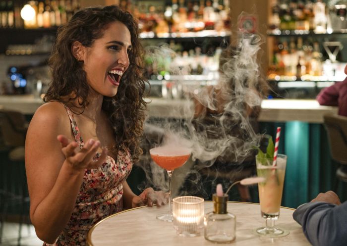 Woman enjoying a drink at Maybe Sammy cocktail bar in The Rocks, Sydney City