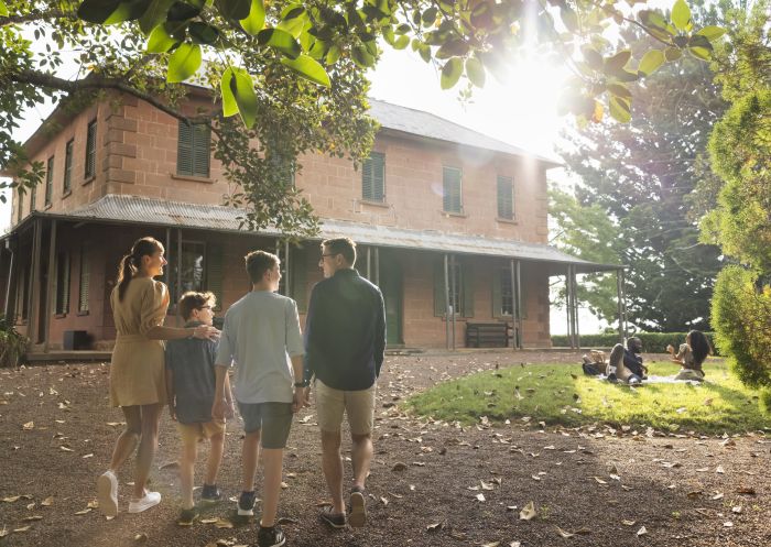 Family enjoying a visit to the heritage-listed Rouse Hill Estate museum, Rouse Hill