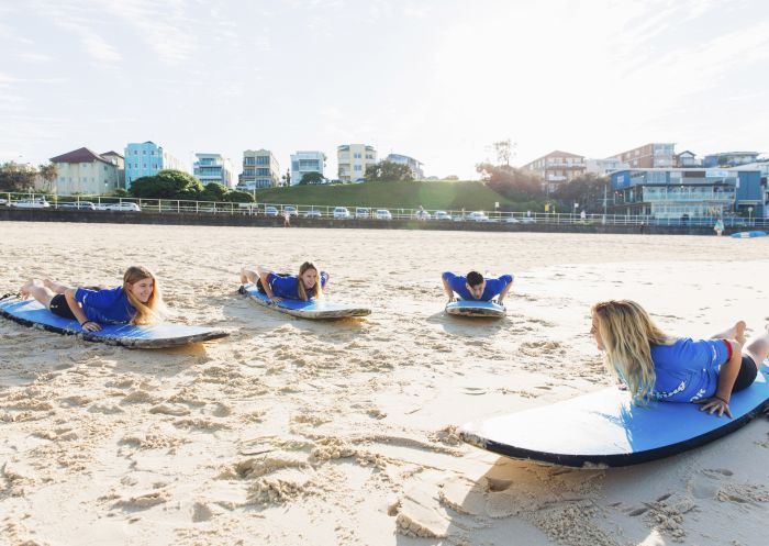 Group learning how to surf with Let's Go Surfing at Bondi Beach, Sydney East