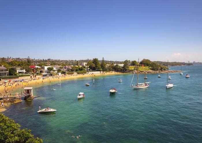 Crowds enjoying the start of the 2018 Sydney to Hobart Yacht Race from Camp Cove, Watsons Bay