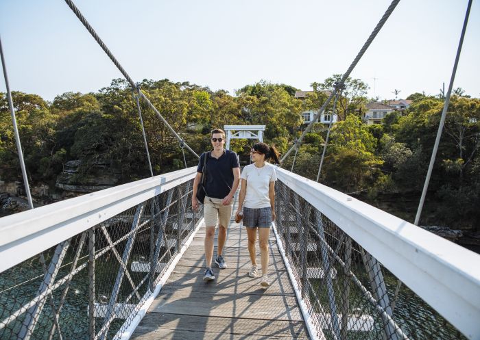 Couple enjoying a scenic walk around Parsley Bay, Vaucluse