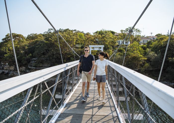 Couple enjoying a scenic walk around Parsley Bay, Vaucluse