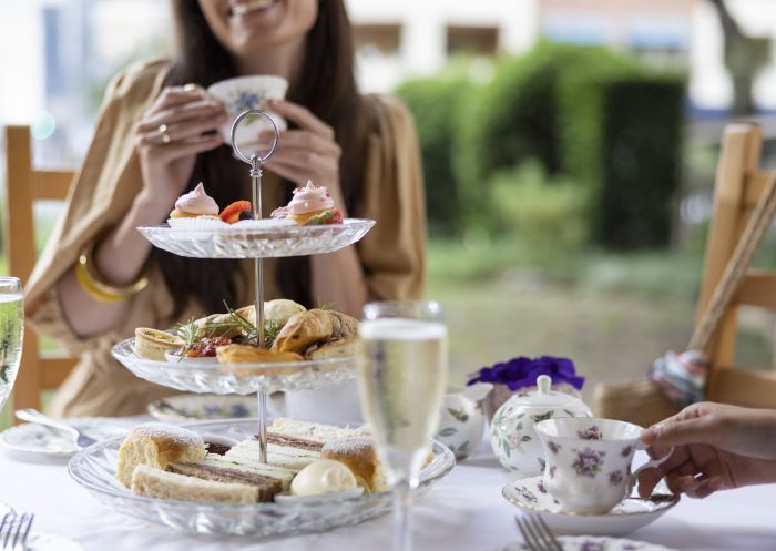 Friends enjoying high tea at the Gatehouse Tea Rooms, Parramatta