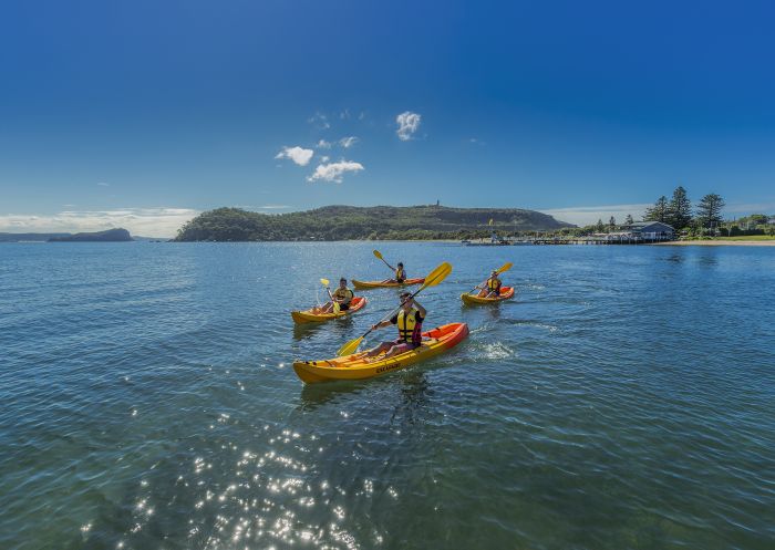 Friends kayaking on Pittwater near Boathouse Restaurant and Palm Beach Lighthouse