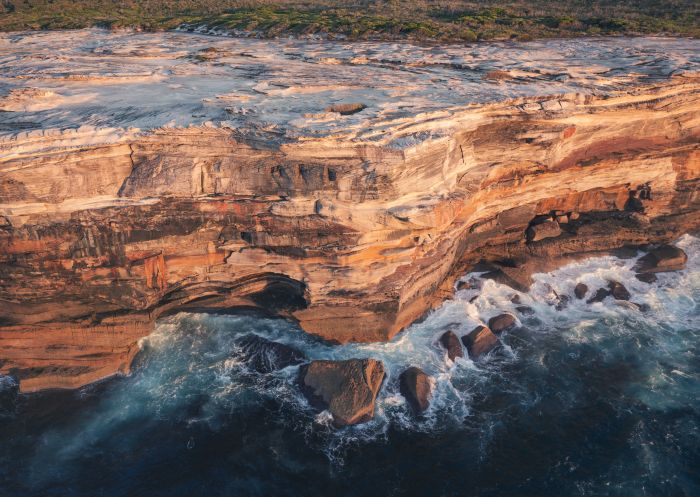 Sandstone cliff walls lining the Kamay Botany Bay National Park, Kurnell