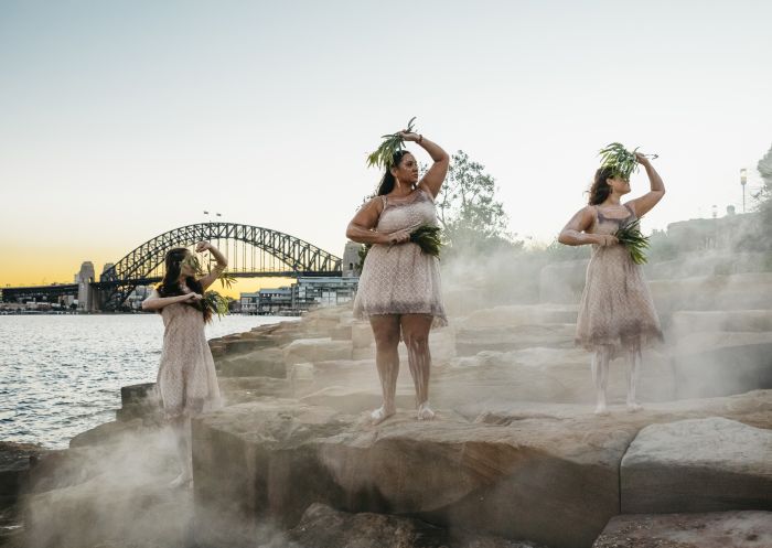 Aboriginal dancers from the Jannawi Dance Clan sharing an immersive cultural experience during an Aboriginal Cultural Tour in Barangaroo, Sydney