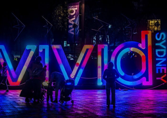 The Vivid Sydney logo shining bright in First Fleet Park, The Rocks during VIvid Sydney 2022.