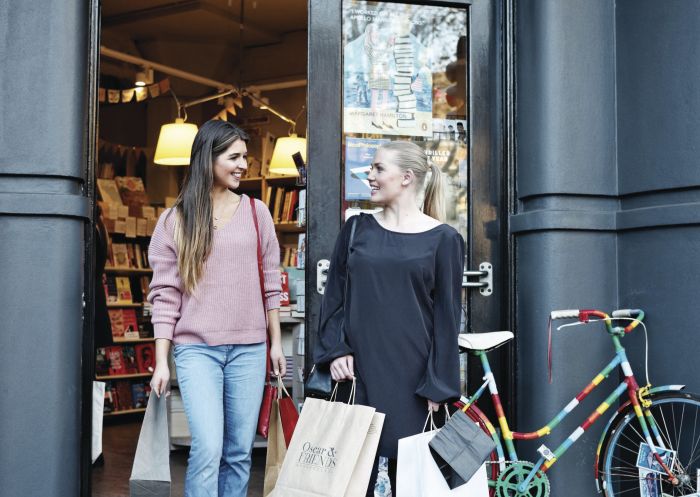 Friends enjoying a day of shopping in Oscar & Friends Booksellers, Surry Hills