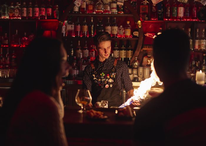 Bartender creating a cocktail at Uncle Mings bar in Sydney's CBD