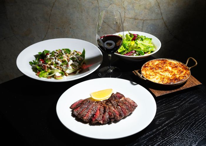 Steak and salad at Rockpool Bar and Grill in City Centre, Sydney City