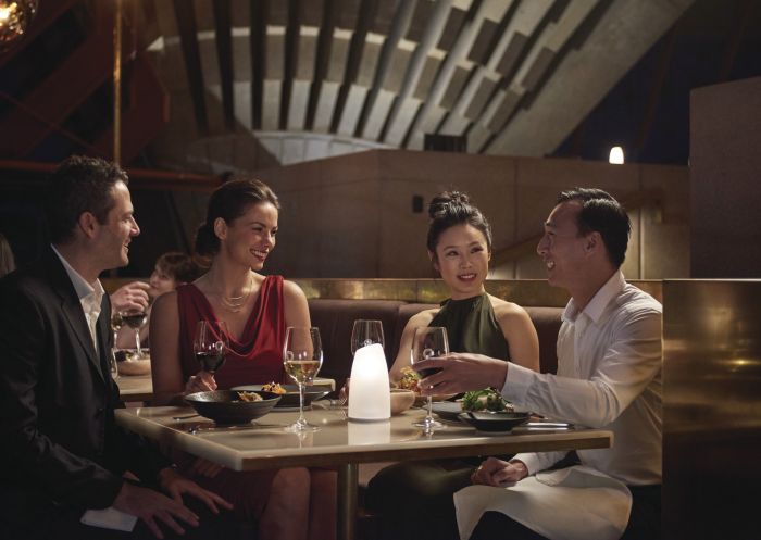 Couples enjoying an evening out at Bennelong Restaurant in Sydney Opera House, Sydney City