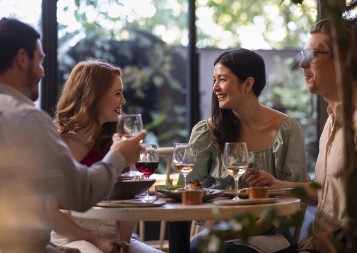 Friends enjoying Middle Eastern cuisine at Nour Restaurant, Surry Hills