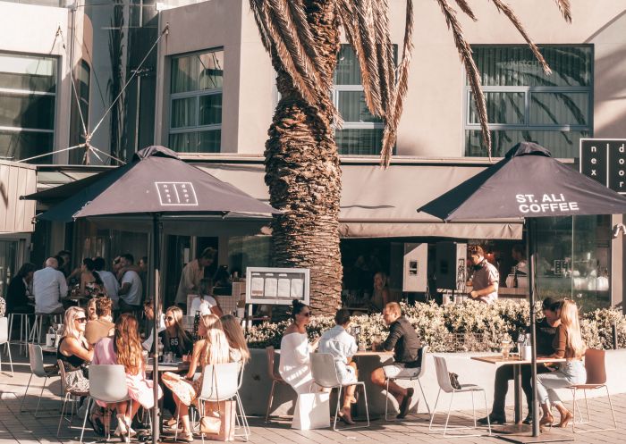 People enjoying breakfast at Next Door Cafe, Cronulla