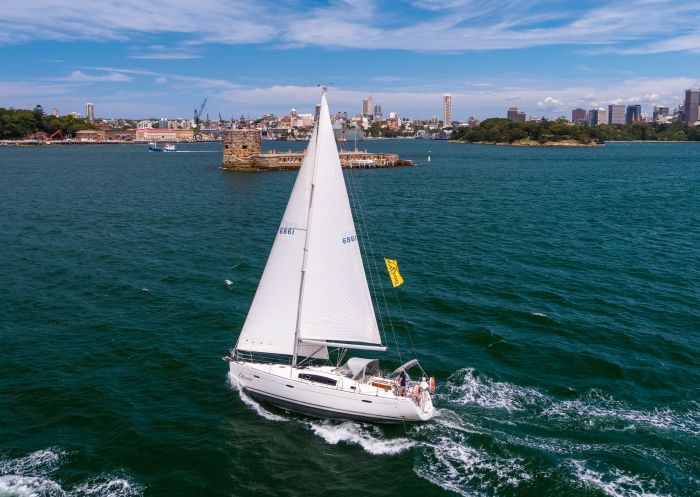 People enjoying chartered sailing tour, Sydney Harbour