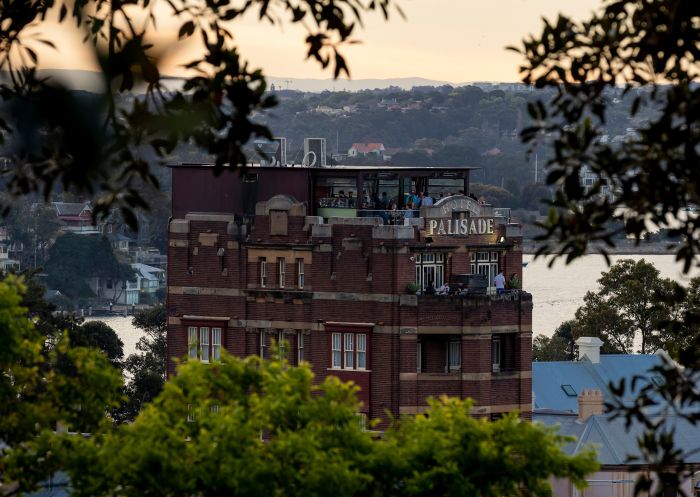 View of the Hotel Palisade rooftop bar from Observatory Hill, Millers Point