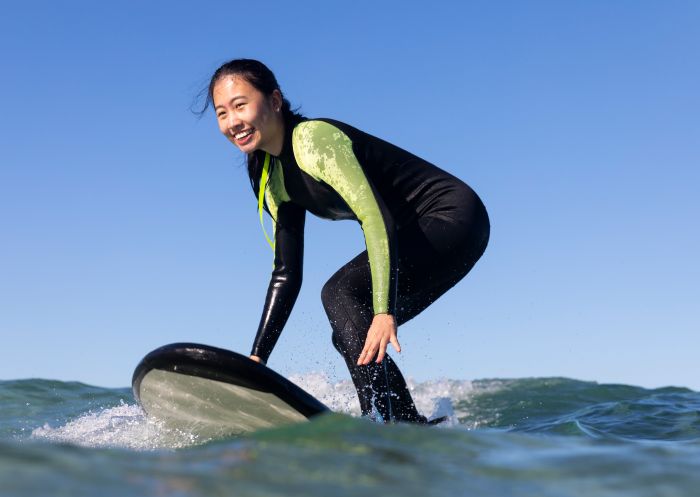 Woman enjoying surf with Go Surfing, Bondi Beach