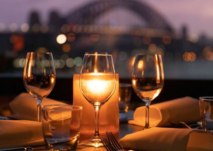 Rooftop dining with views across Sydney Harbour at Cafe Sydney, Sydney