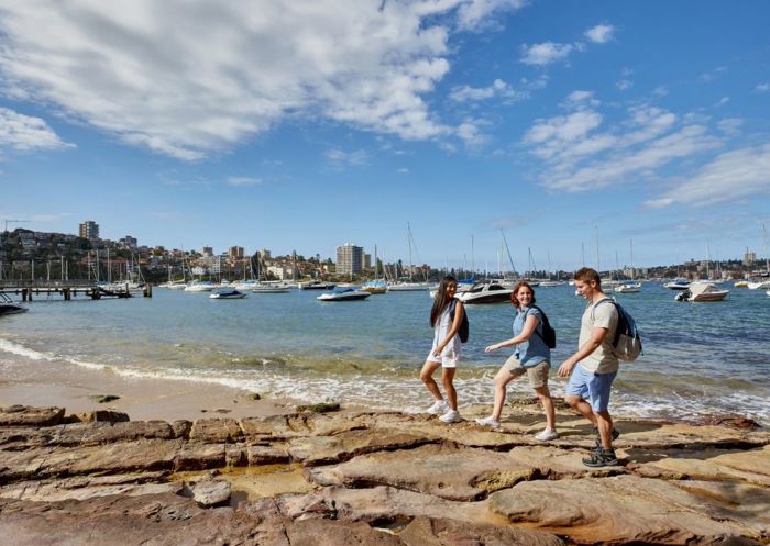 Friends enjoying a walk along Forty Baskets Beach, Balgowlah