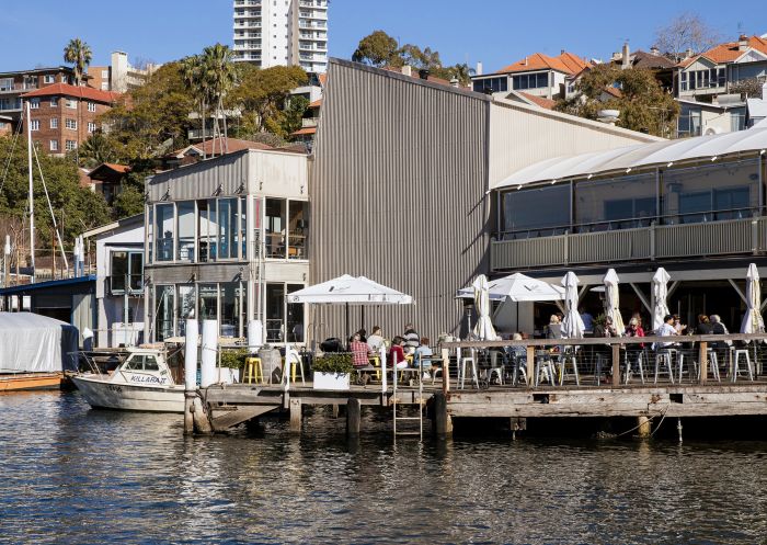 Patrons at Bayly's Restaurant enjoying waterside dining at Ensemble Theatre, Kirribilli 