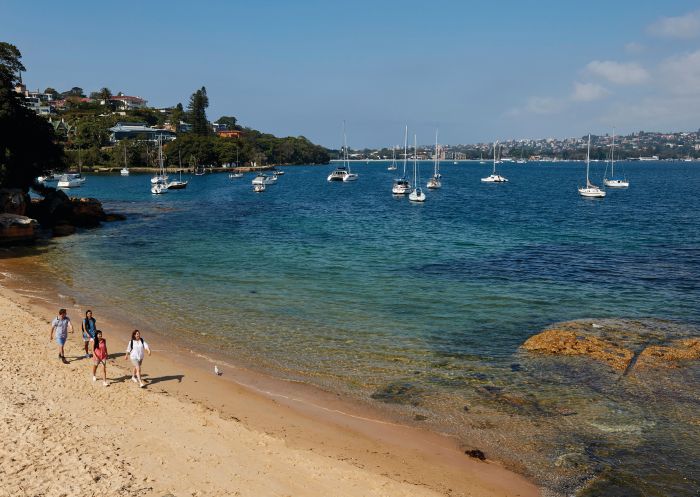 Friends enjoying walk along Milk Beach on the Hermitage Foreshore Track, Vaucluse