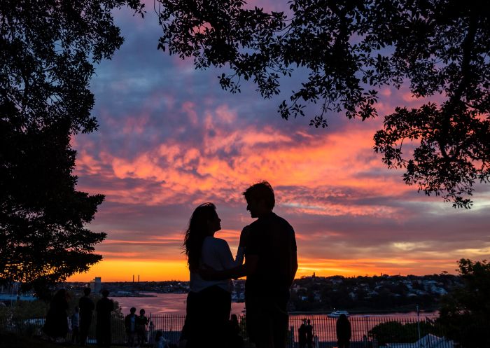 Couple watching the sunset at Observatory Hill, Millers Point