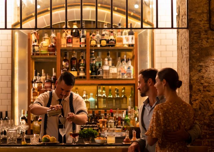 Couple ordering cocktails at Palmer and Co, Sydney CBD