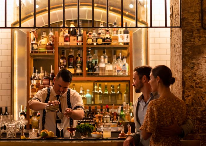 Palmer and Co, Sydney CBD Couple ordering cocktails at Palmer and Co, Sydney CBD
