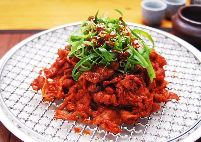 A dish of grilled Korean BBQ meat at Arisun Korean, Haymarket 