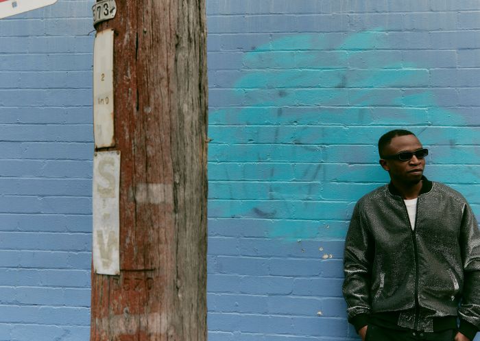 Man wearing jacket from UTurn Vintage, Surry Hills