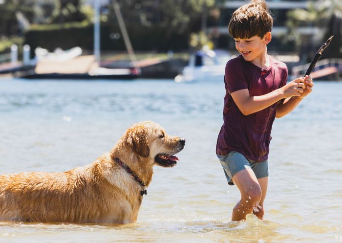 Child with dog at Bayview Dog Park, Bayview