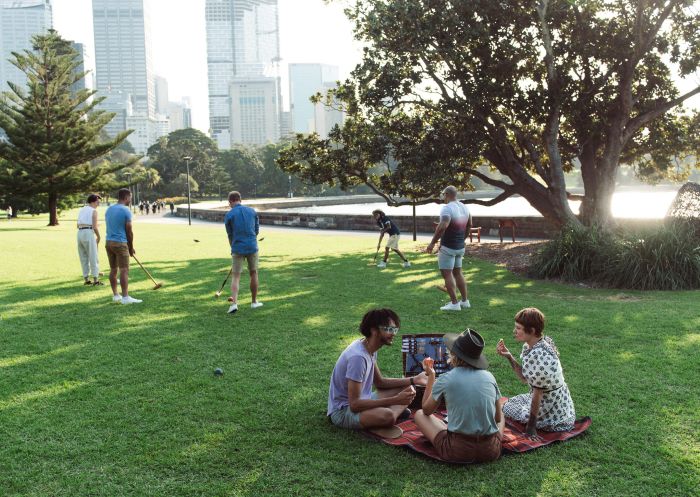 Friends enjoying a picnic at the Royal Botanic Garden, Sydney