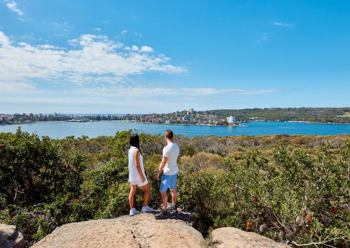 Couple enjoying stunning coastal views of Sydney Harbour from Dobroyd Head, Balgowlah Heights 