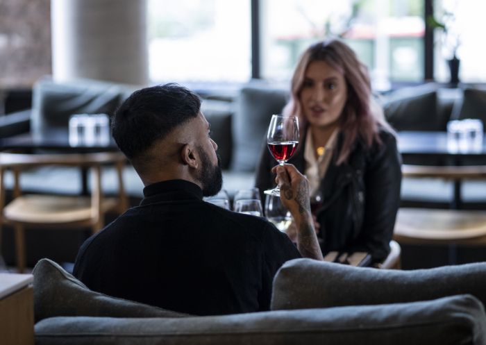 Handpicked Cellar Door, Chippendale Couple tasting red wines at Handpicked Cellar Door, Chippendale