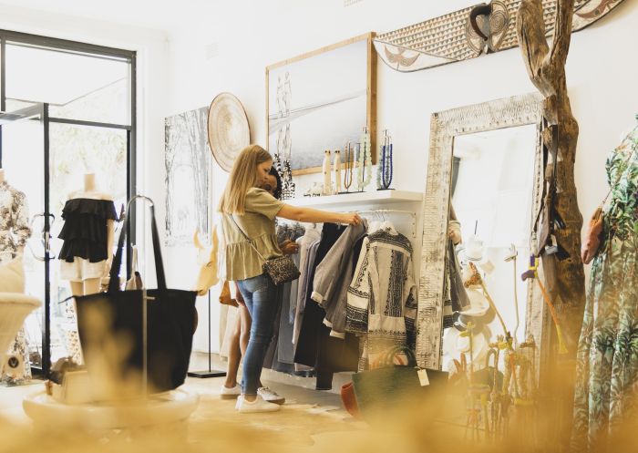 Women shopping for clothing at Africanologie, Avalon