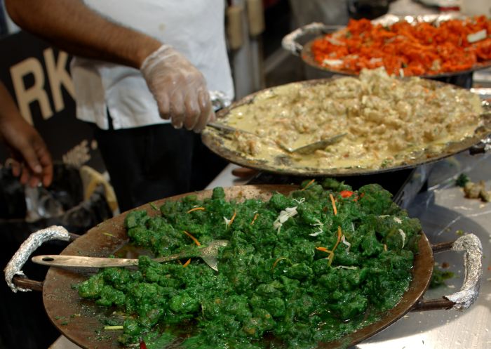 Chicken curry wraps being made at Ramadan Night Markets, Lakemba