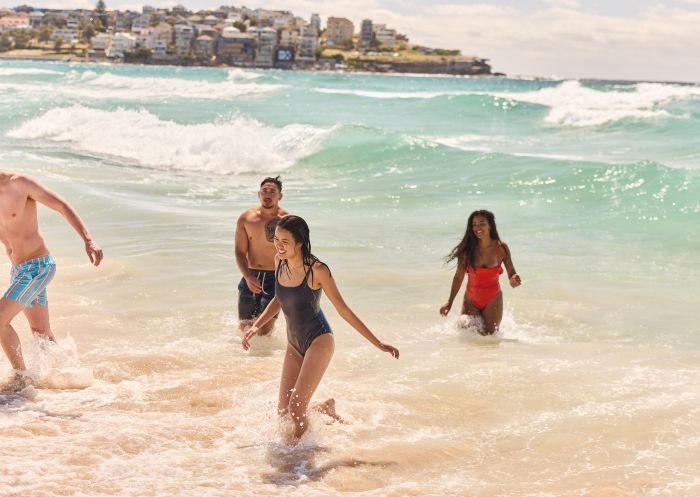 Friends enjoying a swim at Bondi Beach, Bondi