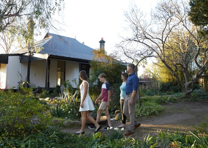 Family enjoying a visit in the grounds of the gallery at Penrith Regional Gallery, Penrith