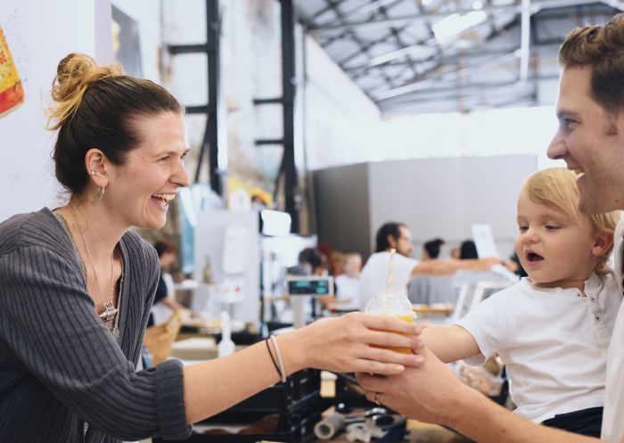 Family enjoying a visit to the Carriageworks Farmers Markets, Eveleigh