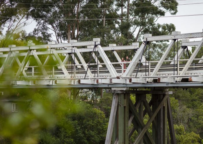 Couple enjoying a visit to the Picton Railway Viaduct in Picton, Sydney west 