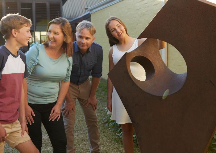 Family enjoying art exhibition at Penrith Regional Gallery, Penrith