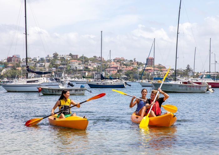 Friends enjoying a day of kayaking, Sydney Harbour 