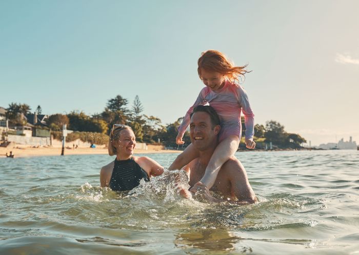 Family enjoying Camp Cove, Watsons Bay