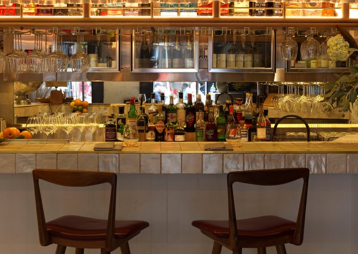 Longshore at the Old Clare Hotel, Chippendale - Credit: Jason Loucas 2 stools at the bar at Longshore at the Old Clare Hotel, Chippendale