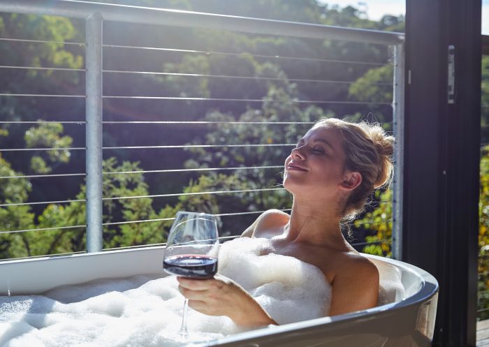 Spicers Sangoma Retreat, Bowen Mountain Woman relaxing in the bath at Spicers Sangoma Retreat, Bowen Mountain